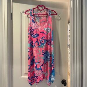 Size M sleeveless Lilly dress with asymmetric hem.